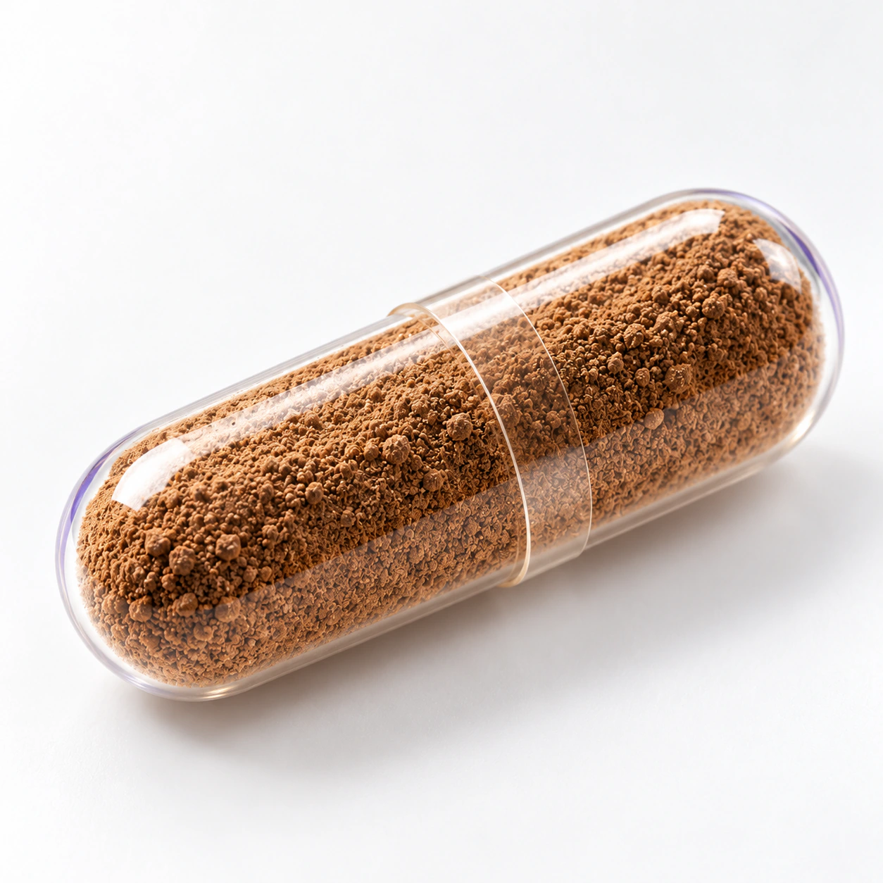 Transparent hard capsule containing dry brown SKF7 extract powder. Illustrative capsule presentation.